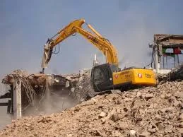 demolição com rompedor hidráulico